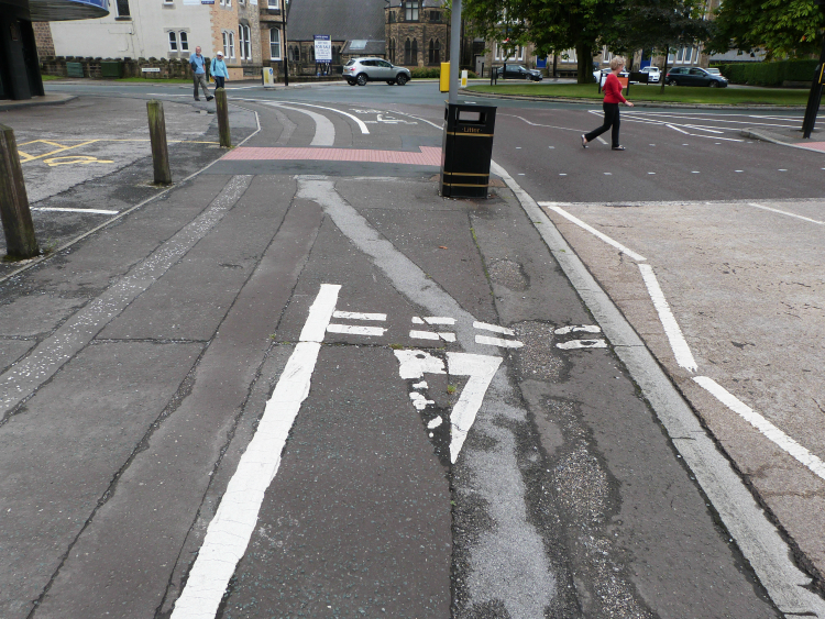 East Parade, Harrogate, cycle lane, give way at bin East Parade, Harrogate, cycle lane, give way at bin
