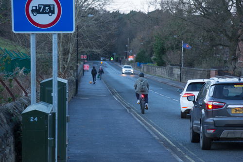 Person on a bike ignoring Miller Homes 'Cycleway'