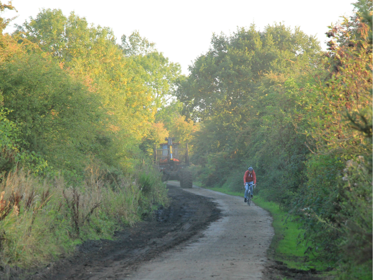 Tractor and bike on Nidderdale Greenway Tractor and bike on Nidderdale Greenway