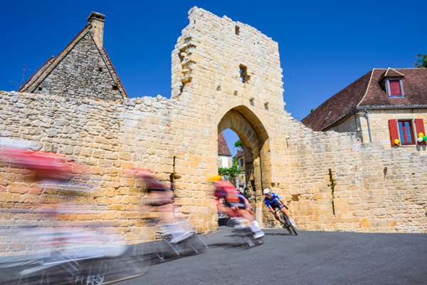 Riders at Domme on Stage 8 TDF 2026